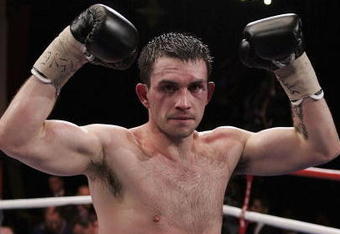LIVERPOOL, ENGLAND - MARCH 10: Paul Smith celebrates winning his fight against Alexander Polizzi during the WBU international Middleweight championship at Liverpool Olympia on March 10, 2007 in Liverpool, England. (Photo by John Gichigi/Getty Images)
