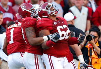TUSCALOOSA, AL - OCTOBER 24:  Lorenzo Washington #97 celebrates with Terrence Cody #62 of the Alabama Crimson Tide after Cody blocked a field goal in the first half against the Tennessee Volunteers at Bryant-Denny Stadium on October 24, 2009 in Tuscaloosa, Alabama.  (Photo by Kevin C. Cox/Getty Images)