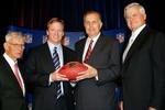 NORTHBROOK, IL - AUGUST 08:  (L-R) Dan Rooney, owner of the Pittsburgh Steelers, new commissioner Roger Goodell, outgoing NFL commissioner Paul Tagliabue and Jerry Richardson, owner of the Carolina Panthers, pose following a press conference announcing the selection of Goodell to be the new NFL commissioner during the NFL owners meeting on August 8, 2006 at the Renaissance Hotel in Northbrook, Illinois.  (Photo by Jonathan Daniel/Getty Images)
