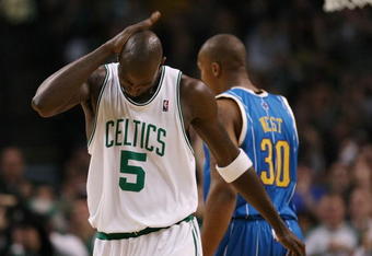 BOSTON - NOVEMBER 01:  Kevin Garnett #5 of the Boston Celtics bats himself on the head in the first half against the New Orleans Hornets at the TD Garden on November 1, 2009 in Boston, Massachusetts.  NOTE TO USER: User expressly acknowledges and agrees that, by downloading and or using this photograph, User is consenting to the terms and conditions of the Getty Images License Agreement.  (Photo by Elsa/Getty Images)
