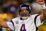 GREEN BAY, WI - NOVEMBER 01: Quarterback Brett Favre #4 of the Minnesota Vikings celebrates a touchdown by teammate Percy Harvin #12 after a 51 yard touchdown pass during the third quarter of the game against the Green Bay Packers at Lambeau Field on November 1, 2009 in Green Bay, Wisconsin. (Photo by Scott Boehm/Getty Images)