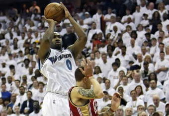 WASHINGTON - APRIL 27: Gilbert Arenas #0 of the Washington Wizards attempts a last second 3-point-shot over Delonte West #13 of the Cleveland Cavaliers in Game Four of the Eastern Conference Quarterfinals during the 2008 NBA Playoffs at the Verizon Center on April 27, 2008 in Washington, DC. The Cleveland Cavaliers won 100-97. NOTE TO USER: User expressly acknowledges and agrees that, by downloading and or using this photograph, User is consenting to the terms and conditions of the Getty Images License Agreement. (Photo by Drew Hallowell/Getty Images)