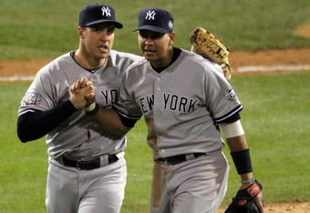 PHILADELPHIA - NOVEMBER 01:  Alex Rodriguez #13 (R) and Mark Teixeira #25 of the New York Yankees celebrate their 7-4 win against the Philadelphia Phillies in Game Four of the 2009 MLB World Series at Citizens Bank Park on November 1, 2009 in Philadelphia, Pennsylvania.  (Photo by Jed Jacobsohn/Getty Images)