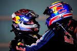 ABU DHABI, UNITED ARAB EMIRATES - NOVEMBER 01:  Sebastian Vettel (L) of Germany and Red Bull Racing celebrates with second placed team mate Mark Webber  (R)of Australia and Red Bull Racing in parc ferme after winning the Abu Dhabi Formula One Grand Prix at the Yas Marina Circuit on November 1, 2009 in Abu Dhabi, United Arab Emirates.  (Photo by Clive Mason/Getty Images)