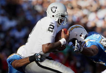 SAN DIEGO, CA - NOVEMBER 1:   Quarterback JaMarcus Russell #2 of the Oakland Raiders is sacked by Steve Gregory #28 of the San DIego Chargers in the 2nd half on November 1, 2009 at Qualcomm Stadium in San Diego, California. (Photo By Donald Miralle/Getty Images)