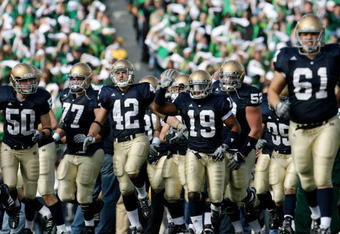SOUTH BEND, IN - OCTOBER 17: Wide receiver George West Jr. #19 of the Notre Dame Fighting Irish leads his team out to the field before they take on the USC Trojans at Notre Dame Stadium on October 17, 2009 in South Bend, Indiana. (Photo by Jonathan Daniel/Getty Images)