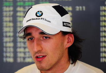 ABU DHABI, UNITED ARAB EMIRATES - OCTOBER 30:  Robert Kubica of Poland and BMW Sauber prepares to drive during practice for the Abu Dhabi Formula One Grand Prix at the Yas Marina Circuit on October 30, 2009 in Abu Dhabi, United Arab Emirates.  (Photo by Clive Mason/Getty Images)