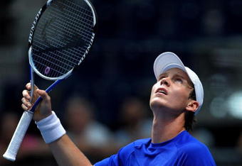 VALENCIA, SPAIN - NOVEMBER 02:  Tomas Berdych of the Czech Republic reacts during his first round match against Paul-Henri Mathieu of France during the ATP 500 World Tour Valencia Open tennis tournament at the Ciudad de las Artes y las Ciencias on November 2, 2009 in Valencia, Spain. Berdych won the match in two sets, 6-3 and 6-4.  (Photo by Jasper Juinen/Getty Images)