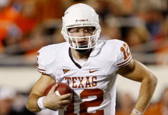 STILLWATER, OK - OCTOBER 31: Quarterback Colt McCoy #12 of the Texas Longhorns runs with the ball in the fourth quarter against the Oklahoma State Cowboys at Boone Pickens Stadium on October 31, 2009 in Stillwater, Oklahoma. (Photo by Ronald Martinez/Getty Images)