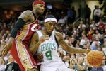 CLEVELAND - OCTOBER 27:  Rajon Rondo #9 of the Boston Celtics drives against Mo Williams #2 of the Cleveland Cavaliers during the season opener at Quicken Loans Arena on October 27, 2009 in Cleveland, Ohio.  NOTE TO USER: User expressly acknowledges and agrees that, by downloading and or using this photograph, User is consenting to the terms and conditions of the Getty Images License Agreement. (Photo by Gregory Shamus/Getty Images)