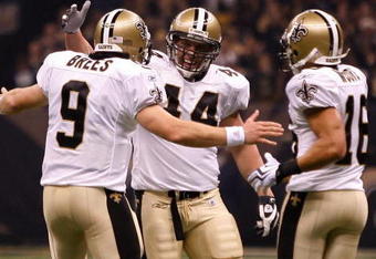 NEW ORLEANS - OCTOBER 18:  Drew Brees #9, Heath Evans #44 and Lance Moore #16 of the New Orleans Saints celebrate after scoring a touchdown against the New York Giants at the Louisiana Superdome on October 18, 2009 in New Orleans, Louisiana.  (Photo by Chris Graythen/Getty Images)