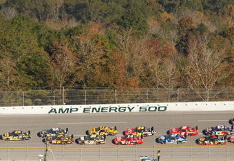 TALLADEGA, AL - NOVEMBER 01:  Jamie McMurray, driver of the #26 IRWIN Marathon Ford, leads the field during the NASCAR Sprint Cup Series AMP Energy 500 at Talladega Superspeedway on November 1, 2009 in Talladega, Alabama.  (Photo by Chris Graythen/Getty Images)