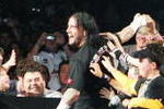 SYDNEY, AUSTRALIA - JUNE 15:  CM Punk celebrates with fans before facing Shelton Benjamin during WWE Smackdown at Acer Arena on June 15, 2008 in Sydney, Australia.  (Photo by Gaye Gerard/Getty Images)