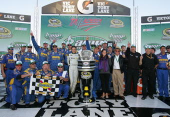 TALLADEGA, AL - NOVEMBER 01:  Jamie McMurray, driver of the #26 IRWIN Marathon Ford, poses in victory lane after winning the NASCAR Sprint Cup Series AMP Energy 500 at Talladega Superspeedway on November 1, 2009 in Talladega, Alabama.  (Photo by Todd Warshaw/Getty Images for NASCAR)