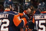 UNIONDALE, NY - NOVEMBER 02: Josh Bailey #12 (L)  and Steve Tambellini #15 (R) of the New York Islanders congratulate Brendan Witt #32 (C) on his second of two goals in the second period against the Edmonton Oilers at the Nassau Coliseum on November 2, 2009 in Uniondale, New York. (Photo by Bruce Bennett/Getty Images)