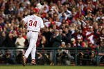 PHILADELPHIA - NOVEMBER 02:  Cliff Lee #34 of the Philadelphia Phillies runs back to the dugout after the final out in the top of the seventh inning against the New York Yankees in Game Five of the 2009 MLB World Series at Citizens Bank Park on November 2, 2009 in Philadelphia, Pennsylvania.  (Photo by Nick Laham/Getty Images)