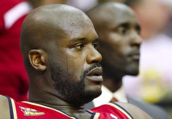 CLEVELAND - OCTOBER 27:  Shaquille O'Neal #33 of the Cleveland Cavaliers rests on the bench during the season opener against the Boston Celtics at Quicken Loans Arena on October 27, 2009 in Cleveland, Ohio.  NOTE TO USER: User expressly acknowledges and agrees that, by downloading and or using this photograph, User is consenting to the terms and conditions of the Getty Images License Agreement. (Photo by Gregory Shamus/Getty Images)