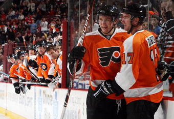 PHILADELPHIA - NOVEMBER 02:  Jeff Carter #17 of the Philadelphia Flyers celebrates his first goal against the Tampa Bay Lightning with teammate James van Riemsdyk #21 on November 2, 2009 at Wachovia Center in Philadelphia, Pennsylvania.  (Photo by Jim McIsaac/Getty Images)