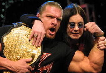 Ozzy Osbourne with WWF wrestler Triple H during a press conference to announce the Ozzfest 2002 line-up and partnership with the WWF at the WWF/World Theater in Times Square in New York City.  3/21/02  Photo by Scott Gries/ImageDirect