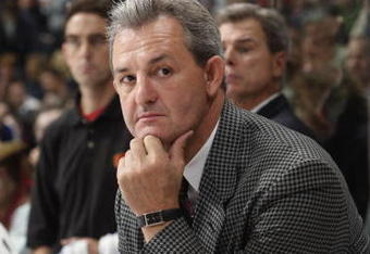 VANCOUVER - SEPTEMBER 30:  Head Coach Darryl Sutter of the Calgary Flames looks on against the Vancouver Canucks during their pre-season NHL game at General Motors Place on September 30, 2005 in Vancouver, Canada.   (Photo by Jeff Vinnick/Getty Images)