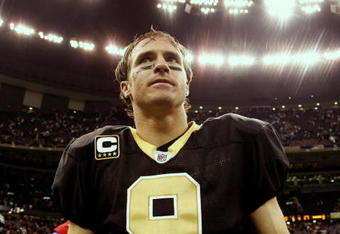 NEW ORLEANS - NOVEMBER 2:  Quarterback Drew Brees #9 of the New Orleans Saints leaves the field after leading his team to a 35-27 victory over the Atlanta Falcons in the game at the Louisiana Superdome on November 2, 2009 in New Orleans, Louisiana. (Photo by Chris Graythen/Getty Images)