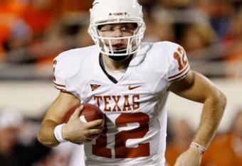 STILLWATER, OK - OCTOBER 31: Quarterback Colt McCoy #12 of the Texas Longhorns runs with the ball in the fourth quarter against the Oklahoma State Cowboys at Boone Pickens Stadium on October 31, 2009 in Stillwater, Oklahoma. (Photo by Ronald Martinez/Getty Images)