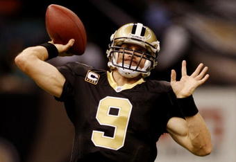 NEW ORLEANS - NOVEMBER 2:  Quarterback Drew Brees #9 of the New Orleans Saints warms up before his team takes on the Atlanta Falcons in the game at the Louisiana Superdome on November 2, 2009 in New Orleans, Louisiana. (Photo by Chris Graythen/Getty Images)