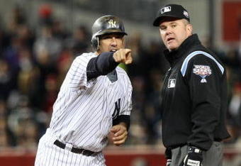 NEW YORK - OCTOBER 29:  Jorge Posada #20 of the New York Yankees agrues being called out by umpire Mike Everitt in the seventh inning against the Philadelphia Phillies in Game Two of the 2009 MLB World Series at Yankee Stadium on October 29, 2009 in the Bronx borough of New York City.  (Photo by Jed Jacobsohn/Getty Images)