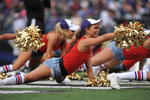 BALTIMORE - NOVEMBER 1:  Cheerleaders for the Baltimore Ravens cheer against the Denver Broncos at M&T Bank Stadium on November 1, 2009 in Baltimore, Maryland. The Ravens defeated the Broncos 30-7. (Photo by Larry French/Getty Images)
