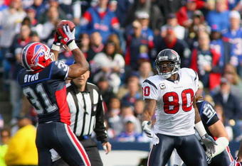 ORCHARD PARK, NY - NOVEMBER 01: Jairus Byrd #31 of the Buffalo Bills intercepts a pass that deflected off of Andre Johnson #80 of the Houston Texans at Ralph Wilson Stadium on November 1, 2009 in Orchard Park, New York.  (Photo by Rick Stewart/Getty Images)