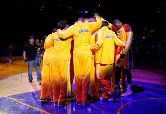 LOS ANGELES, CA - OCTOBER 30: Los Angeles Lakers huddle before the start of their NBA basketball game against the Dallas Mavericks at Staples Center on October 30, 2009 in Los Angeles, California.  NOTE TO USER: User expressly acknowledges and agrees that, by downloading and/or using this Photograph, user is consenting to the terms and conditions of the Getty Images License Agreement.  (Photo by Kevork Djansezian/Getty Images)