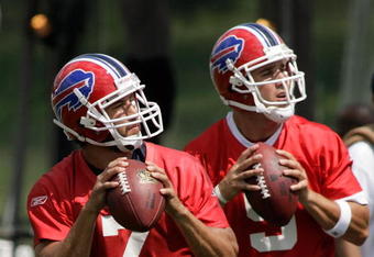 PITTSFORD, NY - JULY 25:  JP Losman #7 and Trent Edwards #5  of the Buffalo Bills drop back to pass during Training Camp on July 25, 2008 at Saint John Fisher College in Pittsford, New York.  (Photo by Rick Stewart/Getty Images)