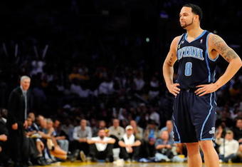 LOS ANGELES, CA - APRIL 21:  Deron Williams #8 of the Utah Jazz looks on in the second half against the Los Angeles Lakers in Game Two of the Western Conference Quarterfinals during the 2009 NBA Playoffs at Staples Center on April 21, 2009 in Los Angeles, California. NOTE TO USER: User expressly acknowledges and agrees that, by downloading and or using this photograph, User is consenting to the terms and conditions of the Getty Images License Agreement.  (Photo by Kevork Djansezian/Getty Images)