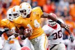 KNOXVILLE, TN - OCTOBER 10: Eric Berry #14 of the Tennessee Volunteers runs with the ball after intercepting a pass during the SEC game against the Georgia Bulldogs at Neyland Stadium on October 10, 2009 in Knoxville, Tennessee. (Photo by Andy Lyons/Getty Images)