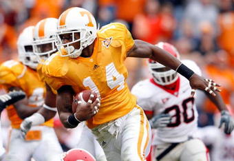 KNOXVILLE, TN - OCTOBER 10: Eric Berry #14 of the Tennessee Volunteers runs with the ball after intercepting a pass during the SEC game against the Georgia Bulldogs at Neyland Stadium on October 10, 2009 in Knoxville, Tennessee. (Photo by Andy Lyons/Getty Images)