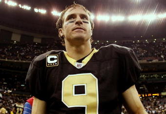 NEW ORLEANS - NOVEMBER 2:  Quarterback Drew Brees #9 of the New Orleans Saints leaves the field after leading his team to a 35-27 victory over the Atlanta Falcons in the game at the Louisiana Superdome on November 2, 2009 in New Orleans, Louisiana. (Photo by Chris Graythen/Getty Images)