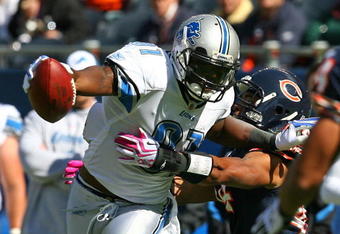 CHICAGO - OCTOBER 04: Calvin Johnson #81 of the Detroit Lions breaks away from Kevin Payne #44 of the Chicago Bears on October 4, 2009 at Soldier Field in Chicago, Illinois. The Bears defeated the Lions 48-24. (Photo by Jonathan Daniel/Getty Images)