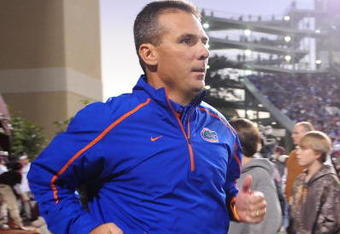 STARKVILLE, MS - OCTOBER 24:  Head coach Urban Meyer of the University of Florida Gators, leads the team onto the field against the Mississippi State Bulldogs, at Davis Wade Stadium on  October 24, 2009 in Starkville, Mississippi  (Photo by Rick Dole/Getty Images)