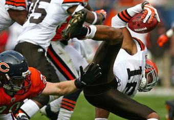 CHICAGO - NOVEMBER 01: Joshua Cribbs #16 of the Cleveland Browns is upended by Craig Steltz #20 of the Chicago Bears at Soldier Field on November 1, 2009 in Chicago, Illinois. The Bears defeated the Browns 30-6. (Photo by Jonathan Daniel/Getty Images)