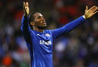 BOLTON, ENGLAND - OCTOBER 31:  Didier Drogba of Chelsea celebrates after scoring the fourth goal during the Barclays Premier League match between Bolton Wanderers and Chelsea at the Reebok Stadium on October 31, 2009 in Bolton,United Kingdom.  (Photo by Alex Livesey/Getty Images)