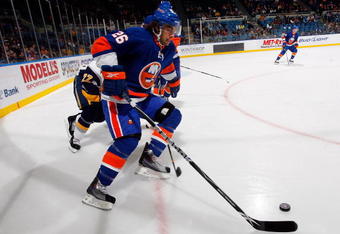 UNIONDALE, NY - OCTOBER 31:  Matt Moulson #26 of the New York Islanders skates against the Buffalo Sabres on October 31, 2009 at Nassau Coliseum in Uniondale, New York. The Isles defeated the Sabres 5-0.  (Photo by Jim McIsaac/Getty Images)