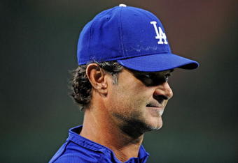 PHILADELPHIA - OCTOBER 09:  Hitting Coach Don Mattingly #8 of the Los Angeles Dodgers participates in batting practice before Game One of the National League Championship Series against the Philadelphia Phillies during the 2008 MLB playoffs on October 9, 2008 at Citizens Bank Ballpark in Philadelphia, Pennsylvania.  (Photo by Jeff Zelevansky/Getty Images)