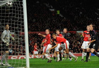 MANCHESTER, ENGLAND - NOVEMBER 03:  Paul Scholes of Manchester United scores his team's second goal during the UEFA Champions League Group B match between Manchester United and CSKA Moscow at Old Trafford on November 3, 2009 in Manchester, England.  (Photo by Michael Regan/Getty Images)