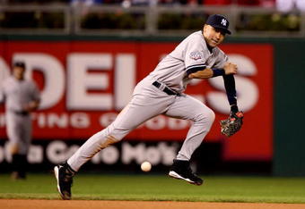 PHILADELPHIA - NOVEMBER 02:  Derek Jeter #2 of the New York Yankees can't make a play on a single hit by Carlos Ruiz #51 of the Philadelphia Phillies in the bottom of the eighth inning  Game Five of the 2009 MLB World Series at Citizens Bank Park on November 2, 2009 in Philadelphia, Pennsylvania.  (Photo by Jed Jacobsohn/Getty Images)