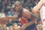 30 Nov 1994:  Center Wayman Tisdale of the Phoenix Suns drives to the basket during a game against the Chicago Bulls at the United Center in Chicago, Illinois.  The Bulls won the game 93-82. Mandatory Credit: Jonathan Daniel  /Allsport
