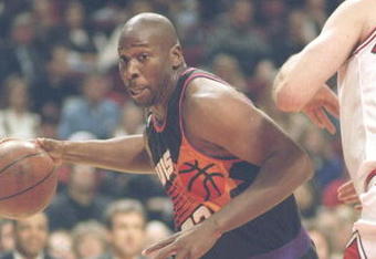 30 Nov 1994:  Center Wayman Tisdale of the Phoenix Suns drives to the basket during a game against the Chicago Bulls at the United Center in Chicago, Illinois.  The Bulls won the game 93-82. Mandatory Credit: Jonathan Daniel  /Allsport