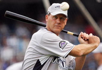 NEW YORK - JULY 14: Jamie Quirk of the Colorado Rockies warms up his team during batting practice for the 2008 MLB All-Star game at Yankee Stadium on July 14, 2008 in the Bronx borough of New York City.  (Photo by Jim McIsaac/Getty Images)