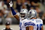 ARLINGTON, TX - NOVEMBER 01:  Wide receiver Roy Williams #11 celebrates a touchdown with Miles Austin #18 of the Dallas Cowboys at Cowboys Stadium on November 1, 2009 in Arlington, Texas.  (Photo by Ronald Martinez/Getty Images)