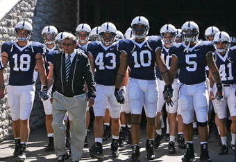 STATE COLLEGE, PA - SEPTEMBER 19: Head coach Joe Paterno of the Penn State Nittany Lions leads his team onto the field before a game against the Temple Owls on September 19, 2009 at Beaver Stadium in State College, Pennsylvania. (Photo by Hunter Martin/Getty Images)