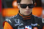 SPARTA, KY - JULY 31:  Danica Patrick driver of the #7 Boost Mobile/Motorola Andretti Green Racing Dallara Honda during a delay in practice for the IRL IndyCar Series Meijer Indy 300 on July 31, 2009 at the Kentucky Speedway in Sparta, Kentucky.  (Photo by Robert Laberge/Getty Images)